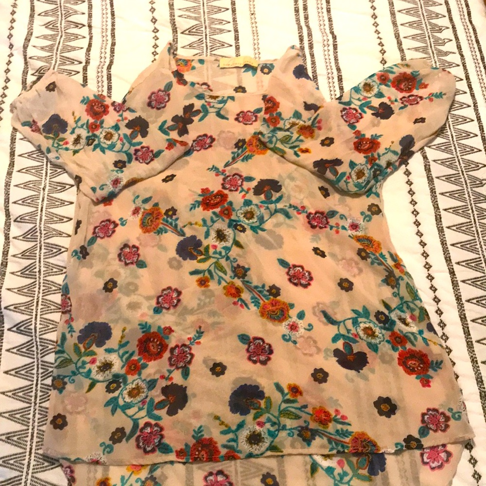 Womens size small sheer high low floral blouse.